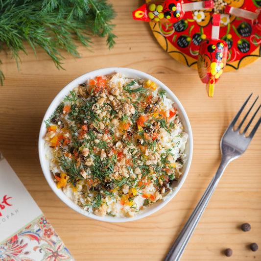 Chiken salad with walnuts cucumber egg prunes e1634994439263