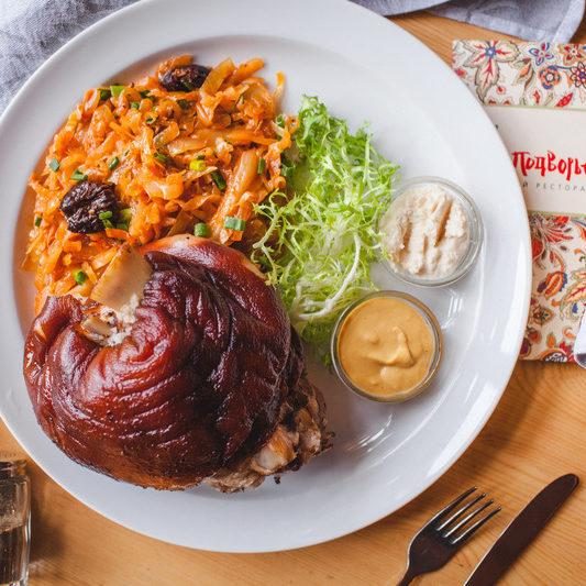 Smoked leg of pork with stewed sauerkraut e1714585779167