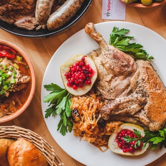 Stewed duck with sauerkraut and baked apple with lingonberries